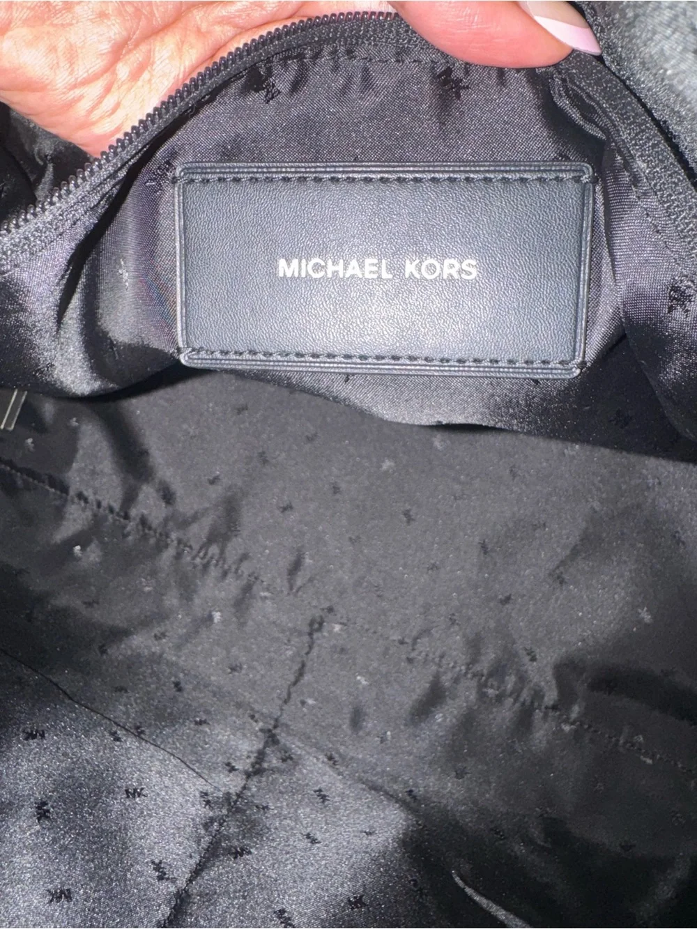 Michael Kors bold logo